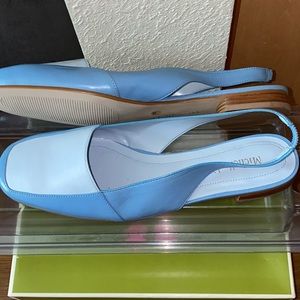 Two pair of shoes different color